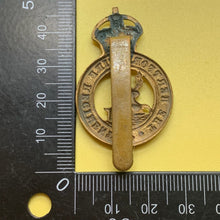 Load image into Gallery viewer, Original WW1 British Army Cap Badge - Hertfordshire Regiment - The Militaria Shop