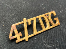 Load image into Gallery viewer, Original WW2 British Army Brass Shoulder Title - 4th 7th Dragoon Guards - The Militaria Shop