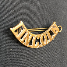 Load image into Gallery viewer, Original WW1 British Army Brass Shoulder Title - Lincoln Regiment - The Militaria Shop