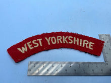 Load image into Gallery viewer, Original WW2 British Army West Yorkshire Regiment Shoulder Title - The Militaria Shop