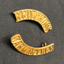 Load image into Gallery viewer, Original WW1/WW2 British Army Red Cross Carmarthen Brass Shoulder Title Set - The Militaria Shop