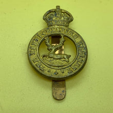 Load image into Gallery viewer, Original WW1 British Army Cap Badge - Hertfordshire Regiment - The Militaria Shop