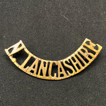 Load image into Gallery viewer, Original WW1 British Army Brass Shoulder Title - North Lancashire - The Militaria Shop