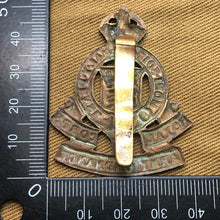 Load image into Gallery viewer, Original WW2 British Army Royal Army Ordnance Corps RAOC Cap Badge - The Militaria Shop