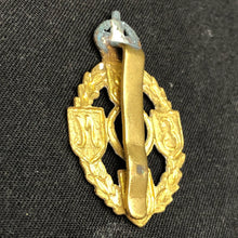 Load image into Gallery viewer, Original British Army Cap Badge - Royal Electrical and Mechanical Engineers - The Militaria Shop