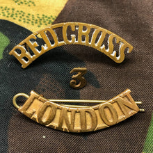 Load image into Gallery viewer, Original WW1 British Army Red Cross Shoulder Title - London - The Militaria Shop