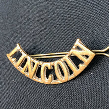 Load image into Gallery viewer, Original WW1 British Army Brass Shoulder Title - Lincoln Regiment - The Militaria Shop