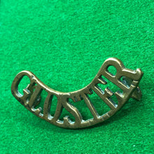 Load image into Gallery viewer, Original WW1 British Army Brass Shoulder Title - Gloster - The Militaria Shop