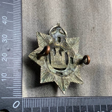 Load image into Gallery viewer, Original WW1 British Army The Devonshire Regiment Cap Badge - The Militaria Shop