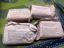 Load image into Gallery viewer, 4 x Original United Nations Individual Field Dressings French & English Wording - The Militaria Shop