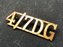 Load image into Gallery viewer, Original WW2 British Army Brass Shoulder Title - 4th 7th Dragoon Guards - The Militaria Shop