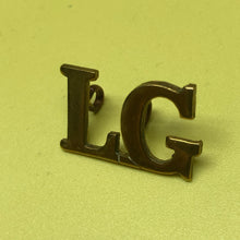 Load image into Gallery viewer, Original WW1/WW2 British Army Brass Shoulder Title L.G Life Guards - The Militaria Shop