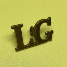 Load image into Gallery viewer, Original WW1/WW2 British Army Brass Shoulder Title L.G Life Guards - The Militaria Shop