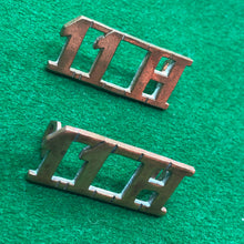 Load image into Gallery viewer, Original WW1 British Army Brass Shoulder Titles - 11th Hussars - The Militaria Shop