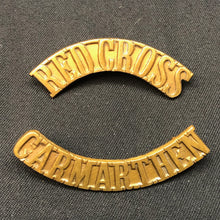 Load image into Gallery viewer, Original WW1/WW2 British Army Red Cross Carmarthen Brass Shoulder Title Set - The Militaria Shop