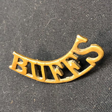 Load image into Gallery viewer, Original WW1 British Army Brass Shoulder Title - Buffs East Kent Regiment - The Militaria Shop