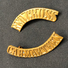Load image into Gallery viewer, Original WW1/WW2 British Army Red Cross Carmarthen Brass Shoulder Title Set - The Militaria Shop