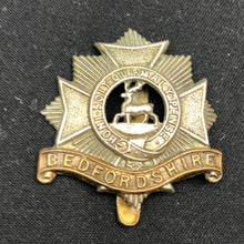 Load image into Gallery viewer, Genuine WW2 British Army Brass Cap Badge - Bedfordshire and Hertfordshire Regt. - The Militaria Shop