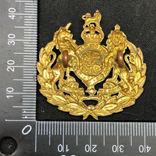 Load image into Gallery viewer, Original WW2 Canadian Army Cap Badge - Royal Army Ordnance Corps Conductors - The Militaria Shop
