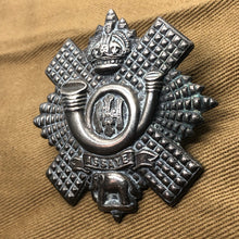 Load image into Gallery viewer, Original WW1 British Army Highland Light Infantry Cap Badge - The Militaria Shop