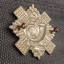 Load image into Gallery viewer, Original WW2 British Army Cap Badge - Highland Light Infantry - The Militaria Shop