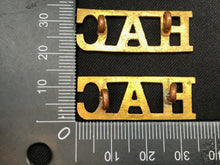 Load image into Gallery viewer, Original WW1 British Army Brass Shoulder Titles - Honourable Artillery Company - The Militaria Shop