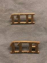Load image into Gallery viewer, Original WW1 British Army 11th Hussars Brass Shoulder Title Pair - The Militaria Shop