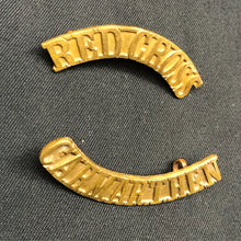 Load image into Gallery viewer, Original WW1/WW2 British Army Red Cross Carmarthen Brass Shoulder Title Set - The Militaria Shop