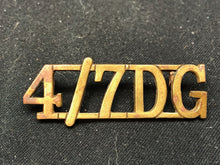 Load image into Gallery viewer, Original WW2 British Army Brass Shoulder Title - 4th 7th Dragoon Guards - The Militaria Shop