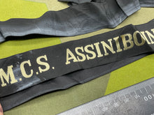 Lade das Bild in den Galerie-Viewer, Original British Royal Navy Cap Tally for HMS Assiniboine - The Militaria Shop