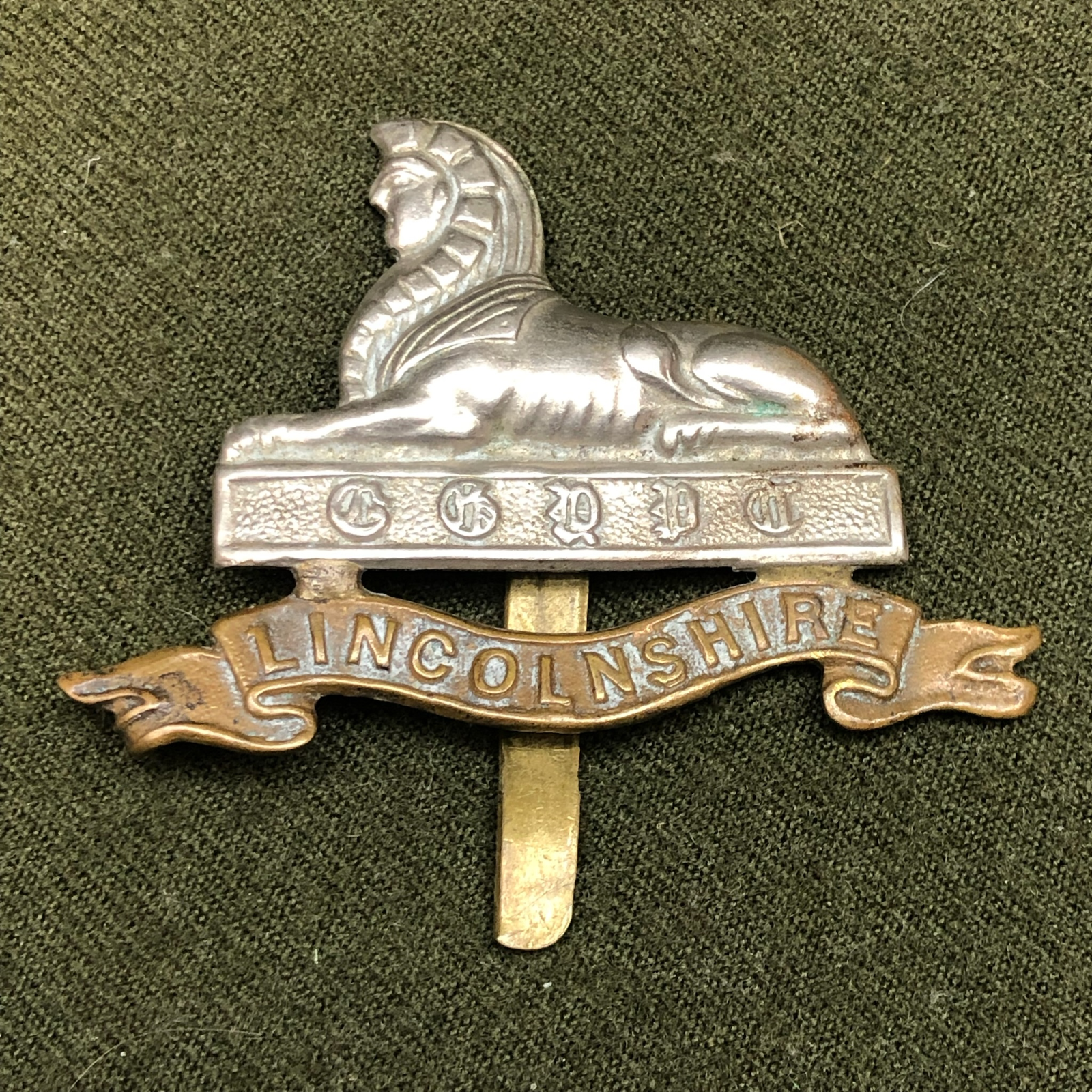Original WW1 British Army Cap Badge Lincolnshire Regiment For