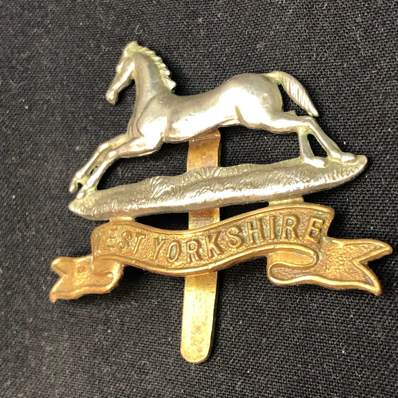 Genuine WW2 British Army Brass Cap Badge - West Yorkshire Regiment - The Militaria Shop