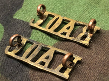 Load image into Gallery viewer, Original WW2 British Army Brass Shoulder Titles - RAOC Royal Army Ordnance Corps - The Militaria Shop