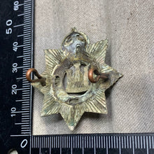 Load image into Gallery viewer, Original WW1 British Army The Devonshire Regiment Cap Badge - The Militaria Shop