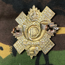 Load image into Gallery viewer, Original WW1 British Cap Badge - Highland Light Infantry - The Militaria Shop