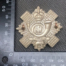 Load image into Gallery viewer, Original WW2 British Army Cap Badge - Highland Light Infantry - The Militaria Shop