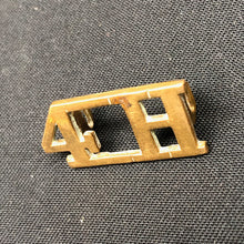 Load image into Gallery viewer, Original WW1 British Army Brass Shoulder Title - 4th Hussars - The Militaria Shop
