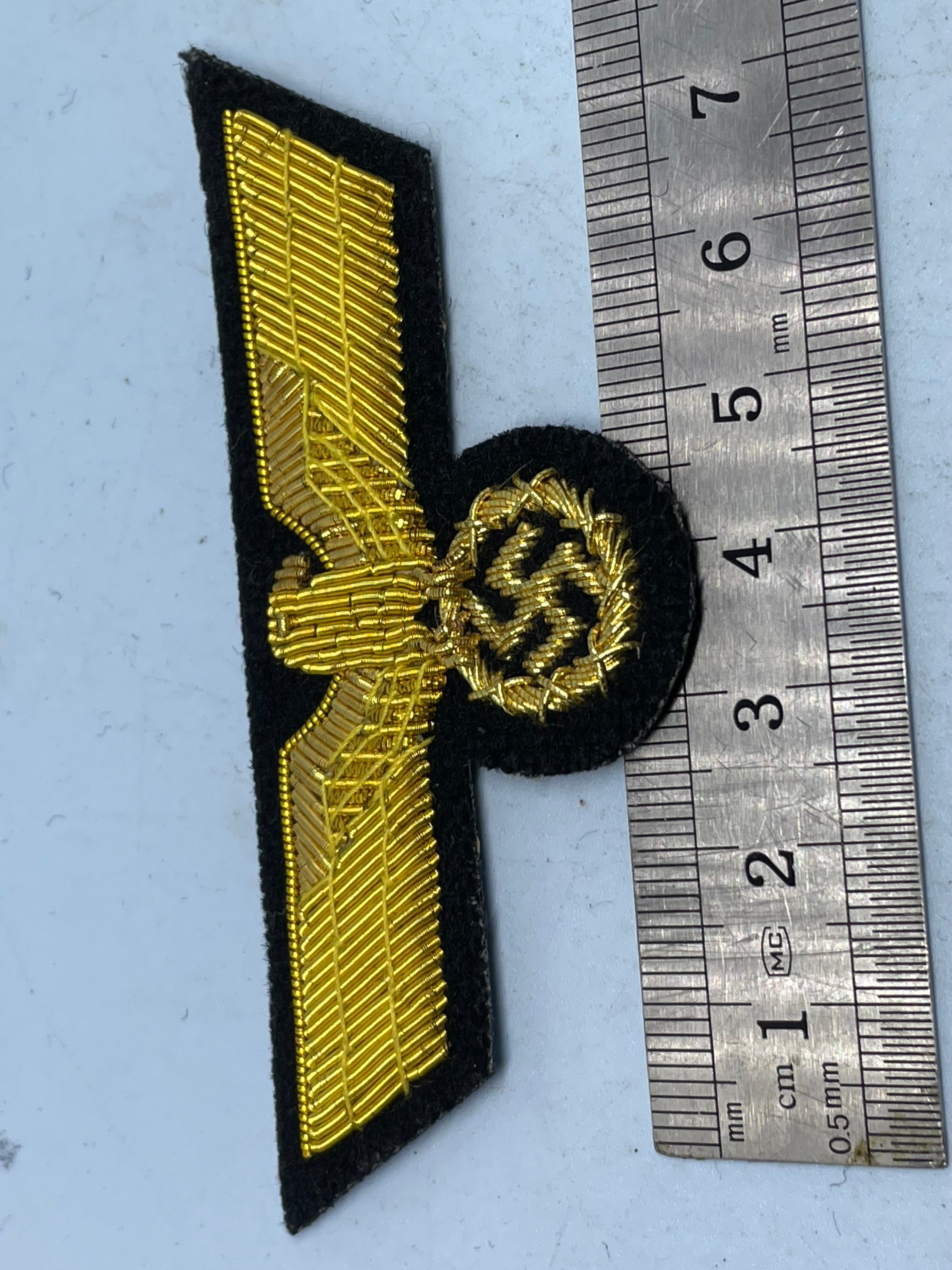 Reproduction WW2 German Kriegsmarine Officer's Bullion Breast Eagle on a black background - The Militaria Shop