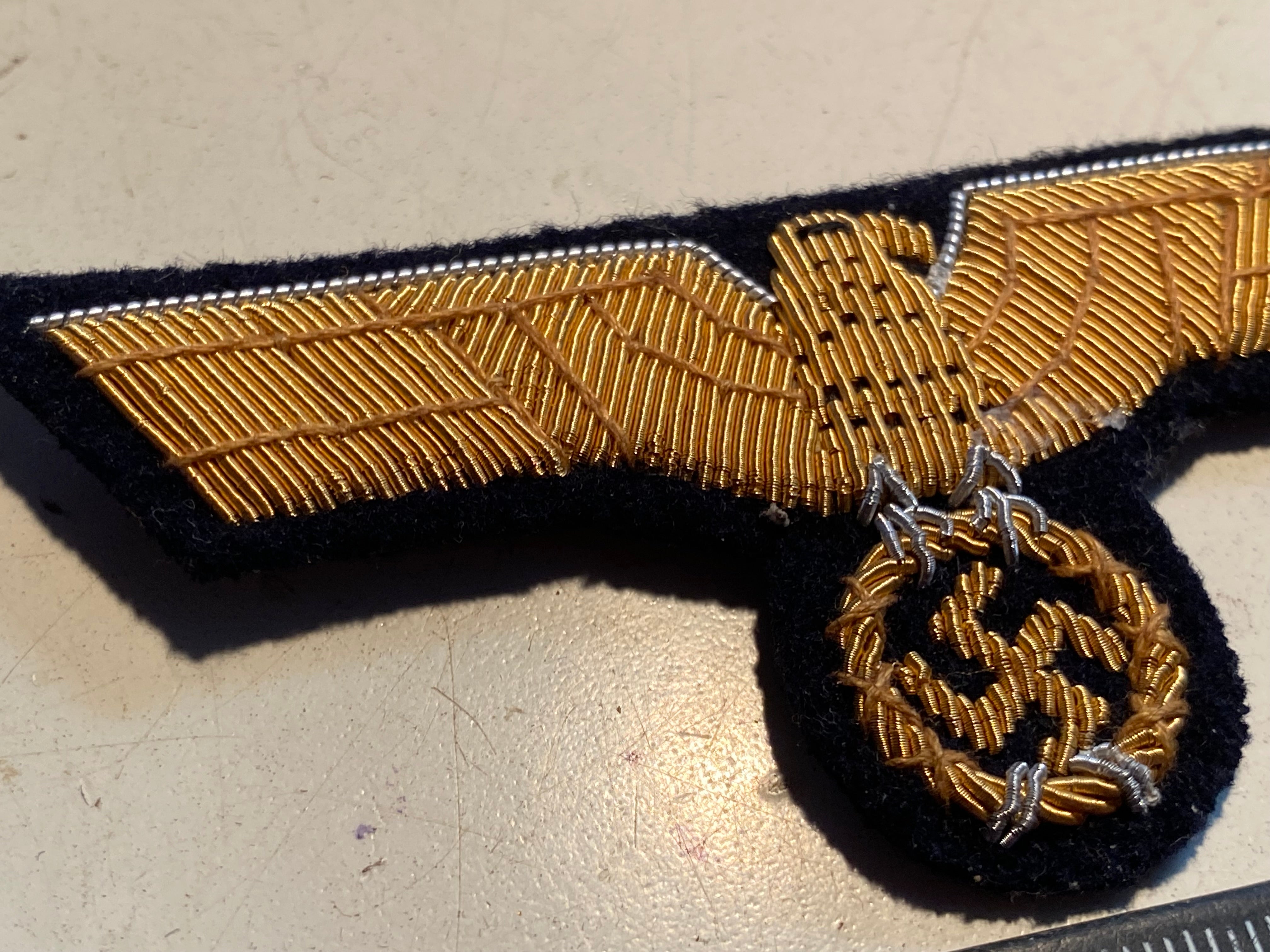 A good reproduction WW2 German Kriegsmarine Officer's Tunic Eagle. - The Militaria Shop