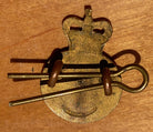 A Queens Crown - British Army CATERING CORPS gilt metal cap / collar badge - B21 - The Militaria Shop