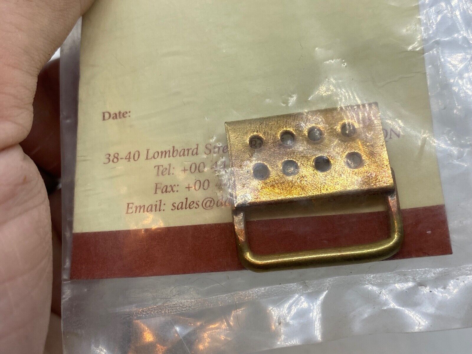 A small gilt Scottish Piper's brass "banner loop" unissued facto - The Militaria Shop
