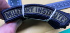 Original Army MILITARY INSTITUTE Badge / Shoulder Title. Brand New Unissued. - The Militaria Shop