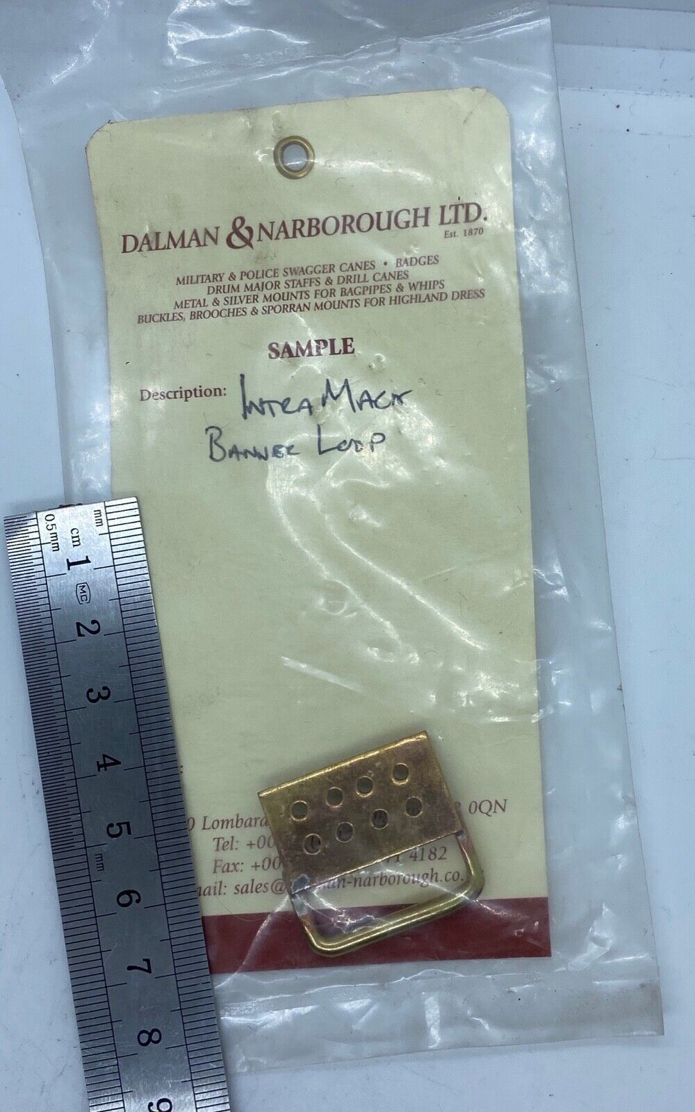 A small gilt Scottish Piper's brass "banner loop" unissued facto - The Militaria Shop