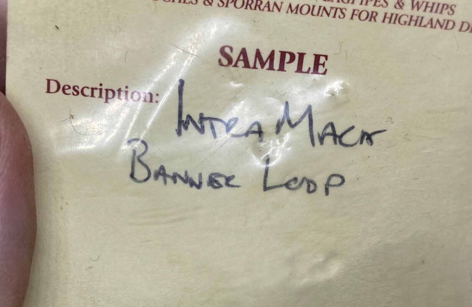 A small gilt Scottish Piper's brass "banner loop" unissued facto - The Militaria Shop