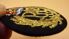 RAF QC - Royal Air Force current issue padded cap badge. Brand new and unissued. - The Militaria Shop