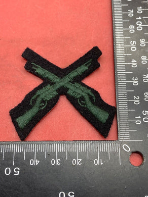 British Army Current Issue Gurkha Regiment Subdued Crossed Rifles Trade Badge. - The Militaria Shop