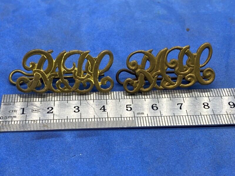 A Pair of Victorian British Army - Royal Army Pay Corps Shoulder Titles. - The Militaria Shop