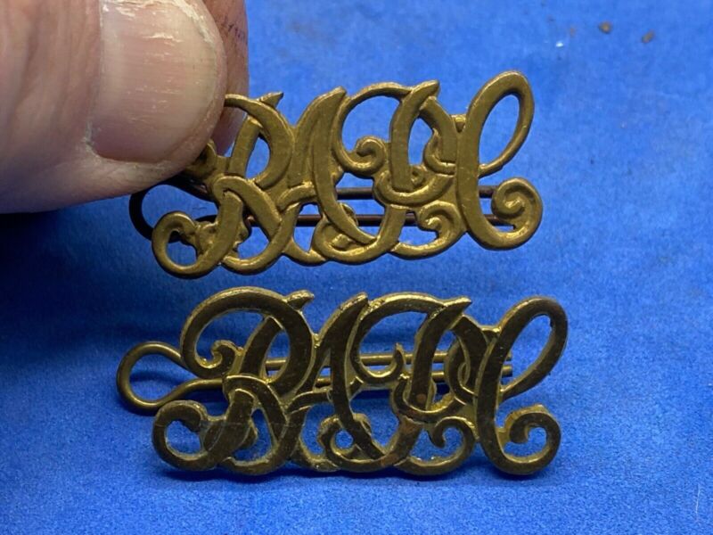 A Pair of Victorian British Army - Royal Army Pay Corps Shoulder Titles. - The Militaria Shop