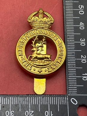 Original British Army The Hertfordshire Regiment Brass Cap Badge. - The Militaria Shop