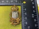 British Army Kings Crown Army Ordnance Corps Cap Badge. Nice example - The Militaria Shop
